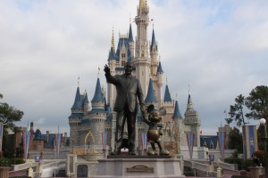 Walt Disney and Mickey Mouse in front of Cinderella's Castle.  Magic Kingdom, Walt Disney World, Orlando, Florida